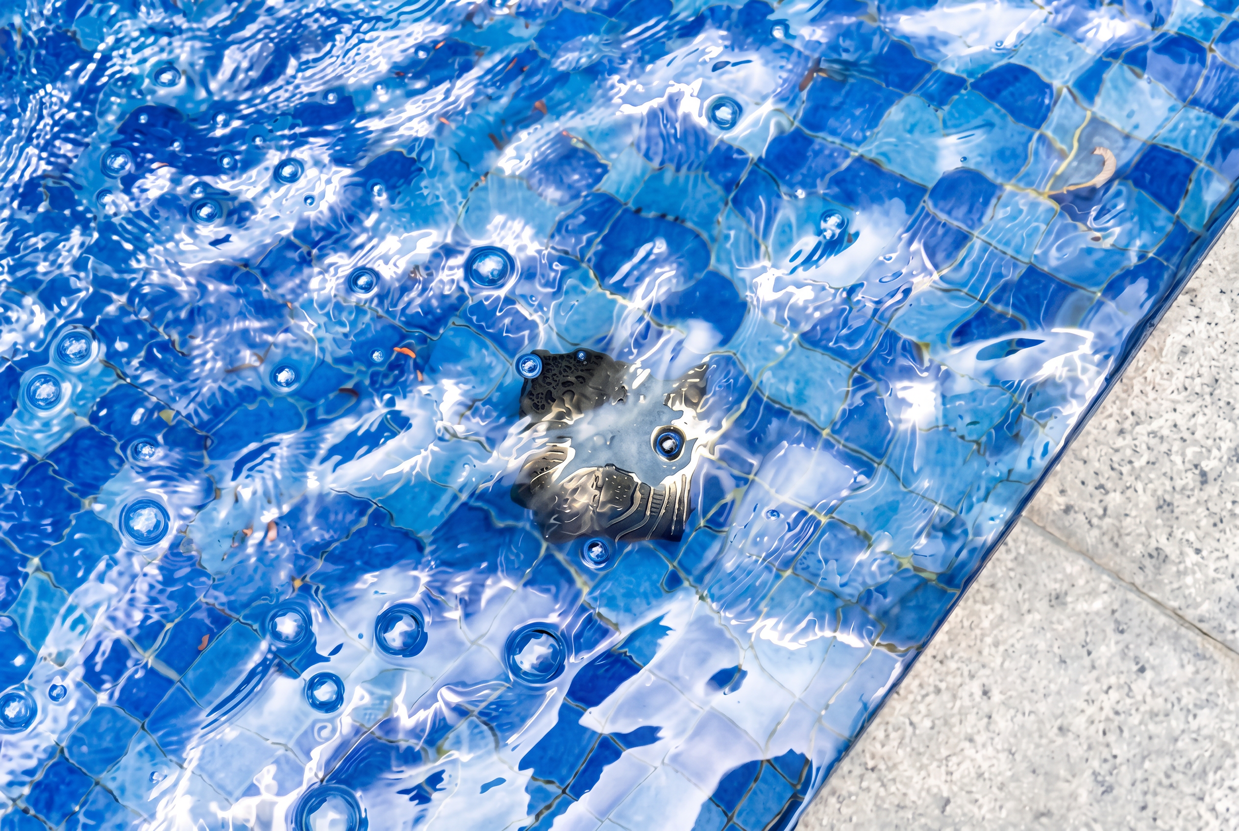 AquaPura Scape operating in a decorative tiled water feature